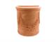 High festooned semicircular Tuscan 001 terracotta pot in Outdoor