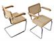 Cesca chair with armrests in chromed metal with wooden frame in Living room