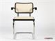 Cesca chair with armrests in chromed metal with wooden frame in Living room