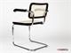 Cesca chair with armrests in chromed metal with wooden frame in Living room