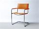 Mart Stamm chair with armrests in chromed metal and leather in Living room