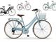 Boulevard Woman with basket Urban-Bike style bicycle in Outdoor