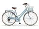 Boulevard Woman with basket Urban-Bike style bicycle in Outdoor