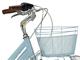 Boulevard Woman with basket Urban-Bike style bicycle in Outdoor