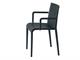 Stackable plastic chair with armrest Nassau in Living room